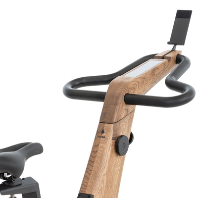 NOHRD Bike V2 Vintage Oak Indoor-Fahrrad mit integriertem Touchscreen – gebeizte Eiche – kostenlose Installation